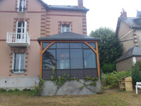 Extension véranda avec arêtier en ardoise